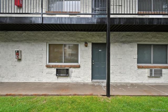 5875 E Iliff Ave Unit 108, Denver, CO 80222 - doorway to property featuring a balcony