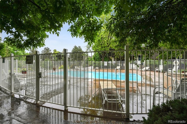 5875 E Iliff Ave Unit 108, Denver, CO 80222 - community pool featuring a patio