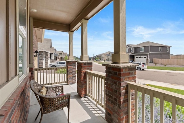13476 Willow St, Thornton, CO 80602 - covered porch featuring a residential view