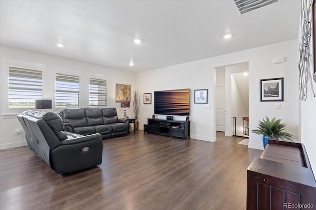 13476 Willow St, Thornton, CO 80602 - living area featuring dark wood finished floors and recessed lighting
