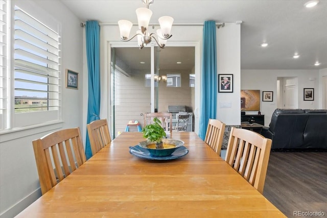 13476 Willow St, Thornton, CO 80602 - dining room featuring a chandelier, recessed lighting, and wood finished floors