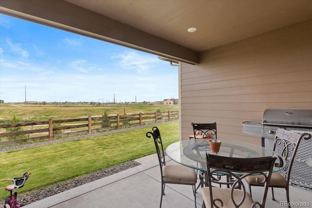13476 Willow St, Thornton, CO 80602 - view of patio / terrace with a view of countryside and outdoor dining space