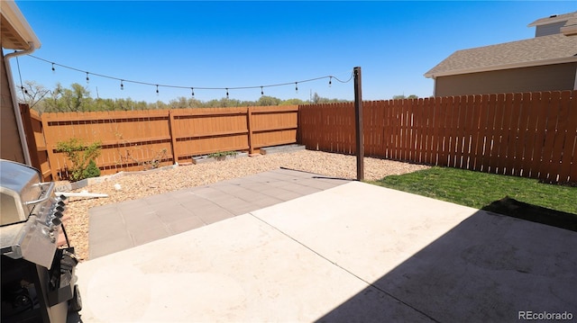 1503 Osage Ave, Fort Morgan, CO 80701 - fenced backyard featuring a patio and area for grilling