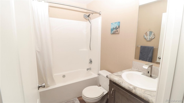 1503 Osage Ave, Fort Morgan, CO 80701 - bathroom featuring shower / bathtub combination with curtain, toilet, and vanity