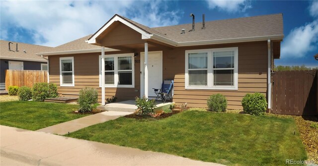 1503 Osage Ave, Fort Morgan, CO 80701 - bungalow-style home featuring a shingled roof