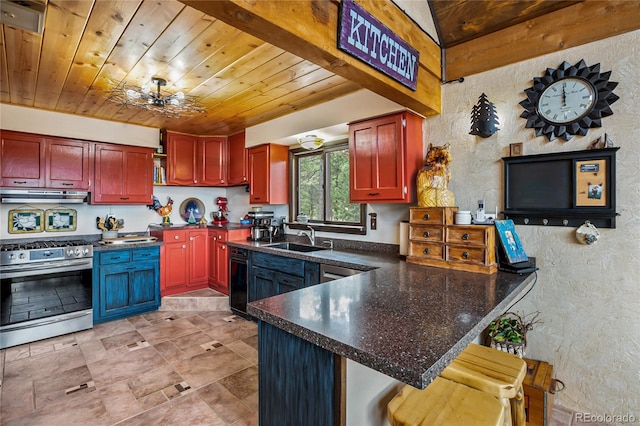 2169 Spruce Rd, Woodland Park, CO 80863 - kitchen with stainless steel range with gas stovetop, under cabinet range hood, a textured wall, dark countertops, and wooden ceiling