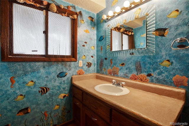 2169 Spruce Rd, Woodland Park, CO 80863 - bathroom featuring wallpapered walls and vanity