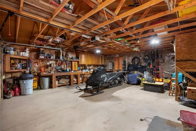 2169 Spruce Rd, Woodland Park, CO 80863 - garage with a workshop area