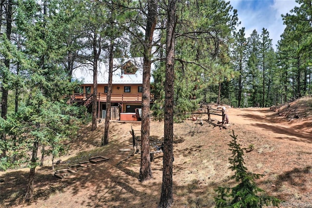 2169 Spruce Rd, Woodland Park, CO 80863 - view of yard with a wooden deck