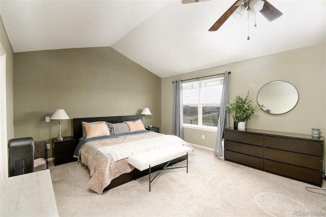 bedroom featuring light carpet, vaulted ceiling, baseboards, radiator heating unit, and a ceiling fan