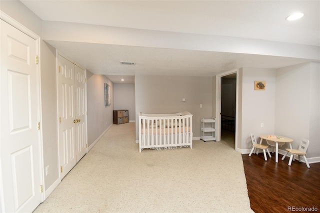 interior space with baseboards, visible vents, and recessed lighting