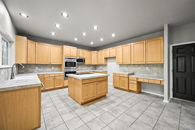 2732 Flint Ct, Superior, CO 80027 - kitchen featuring appliances with stainless steel finishes, a sink, light brown cabinets, and recessed lighting