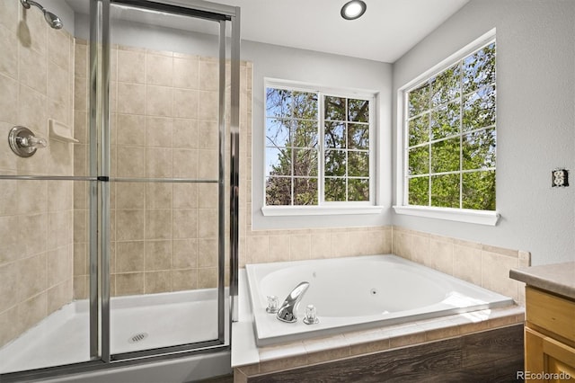 2732 Flint Ct, Superior, CO 80027 - bathroom with a shower stall, a tub with jets, and vanity