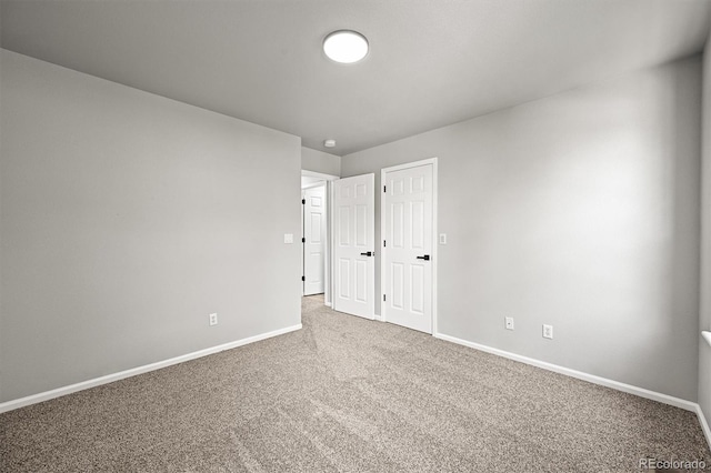 2732 Flint Ct, Superior, CO 80027 - unfurnished bedroom with baseboards and carpet floors