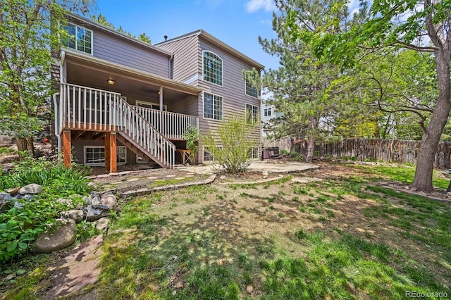 2732 Flint Ct, Superior, CO 80027 - rear view of house with stairway, a patio, and a deck