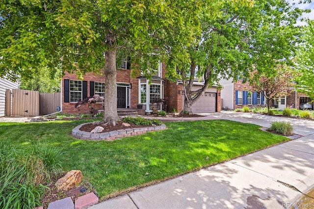 2732 Flint Ct, Superior, CO 80027 - view of property hidden behind natural elements featuring concrete driveway, brick siding, and a garage