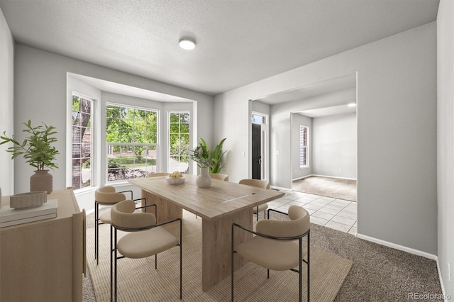 2732 Flint Ct, Superior, CO 80027 - dining space featuring light carpet, baseboards, and light tile patterned floors