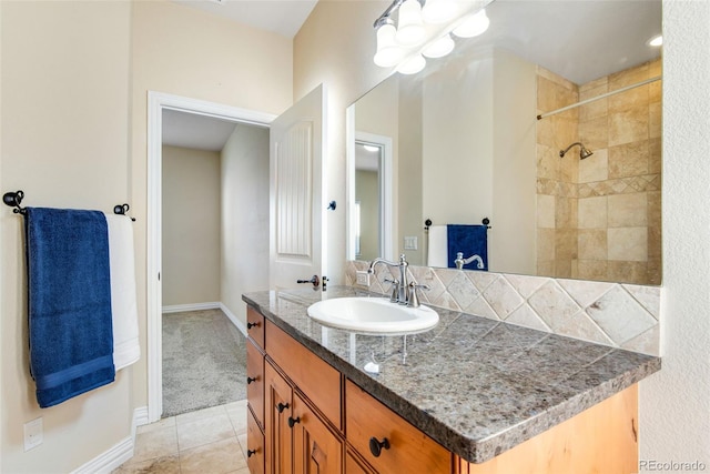 bathroom featuring tile flooring and vanity