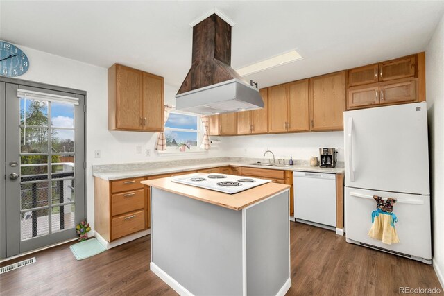 13388 Alcott Cir, Broomfield, CO 80020 - kitchen featuring white appliances, range hood, light countertops, dark wood-type flooring, and a sink