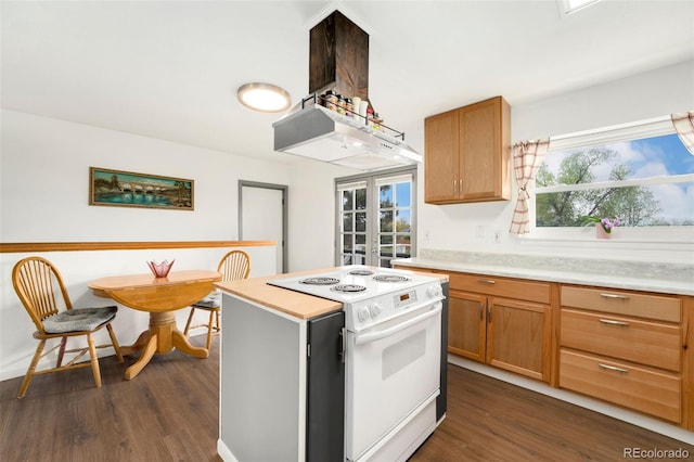 13388 Alcott Cir, Broomfield, CO 80020 - kitchen with electric stove, dark wood-style floors, light countertops, and plenty of natural light