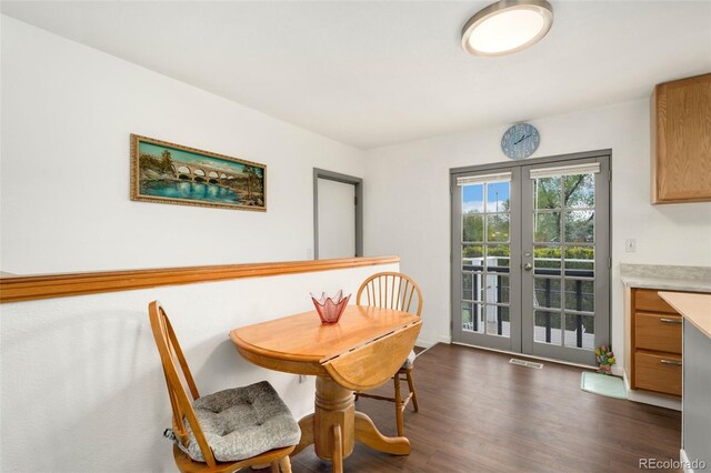 13388 Alcott Cir, Broomfield, CO 80020 - dining area featuring dark wood-type flooring and french doors