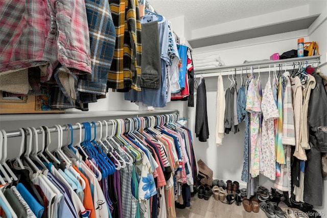 13388 Alcott Cir, Broomfield, CO 80020 - walk in closet with wood finished floors