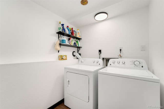 13388 Alcott Cir, Broomfield, CO 80020 - laundry area featuring independent washer and dryer and dark wood finished floors