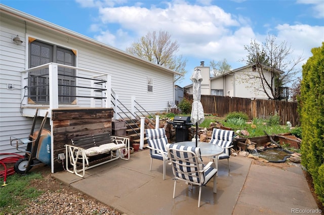 13388 Alcott Cir, Broomfield, CO 80020 - view of patio / terrace featuring fence, outdoor dining area, and area for grilling