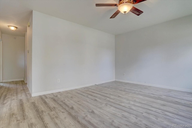 unfurnished room featuring ceiling fan and light hardwood / wood-style flooring