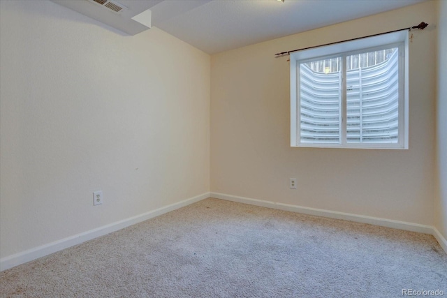 spare room with carpet floors