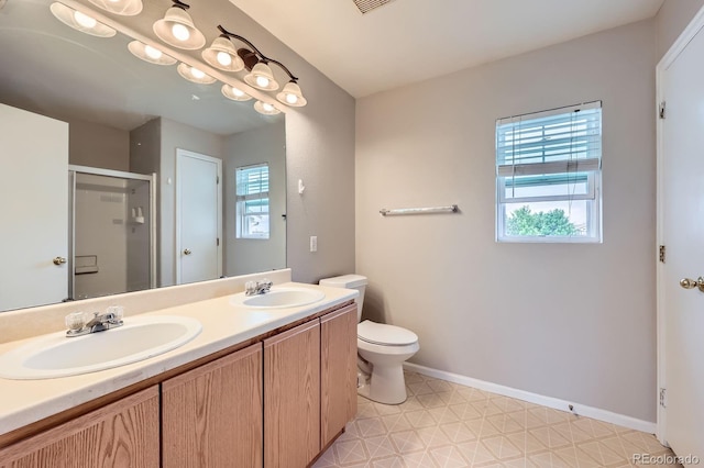 5653 Raleigh Cir, Castle Rock, CO 80104 - bathroom with healthy amount of natural light, tile patterned floors, a stall shower, and toilet