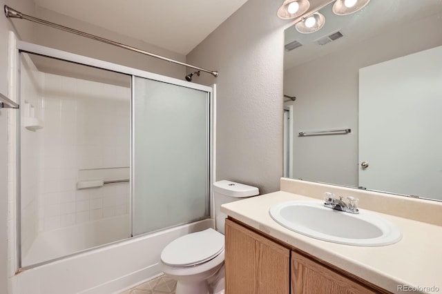 5653 Raleigh Cir, Castle Rock, CO 80104 - full bath featuring toilet, vanity, bath / shower combo with glass door, and a textured wall