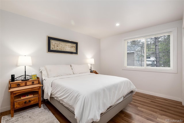 192 Little Creek Rd, Idaho Springs, CO 80452 - bedroom with baseboards, wood finished floors, and recessed lighting