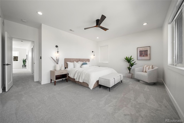 carpeted bedroom featuring visible vents, ceiling fan, recessed lighting, and baseboards