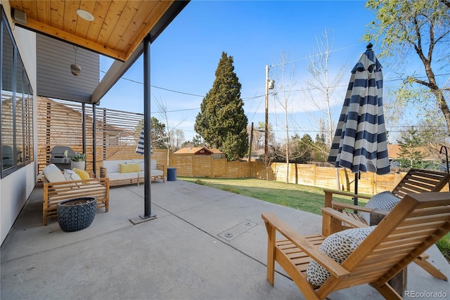 view of patio featuring a fenced backyard and an outdoor hangout area