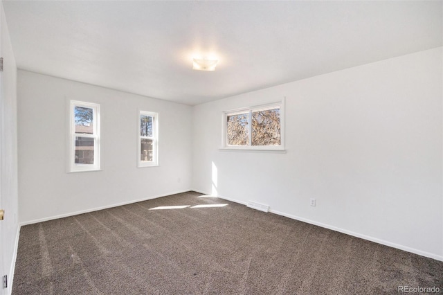 view of carpeted spare room