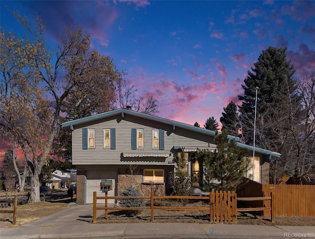 view of front of house with a garage