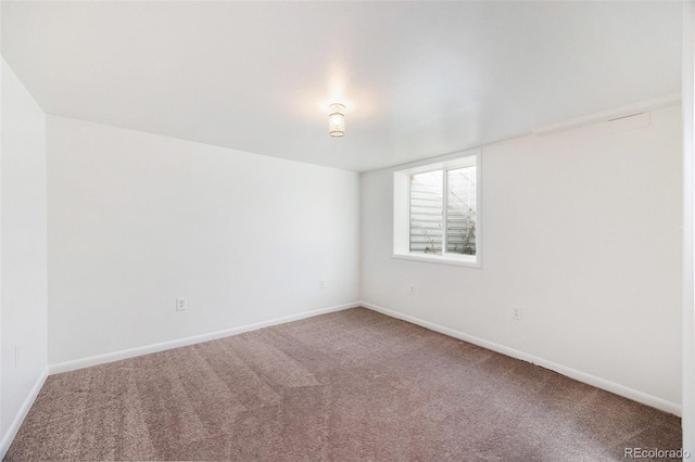 view of carpeted spare room