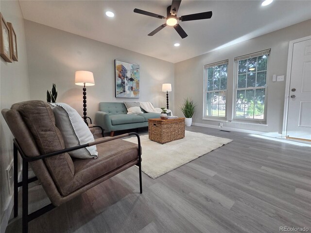 1250 S Monaco Pkwy Unit 17, Denver, CO 80224 - living room featuring a ceiling fan, wood finished floors, recessed lighting, and baseboards
