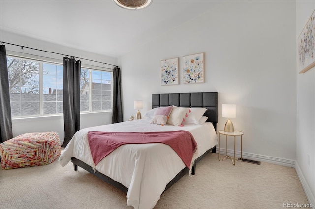 232 W 5th Ave, Denver, CO 80204 - bedroom featuring baseboards, carpet flooring, visible vents, and vaulted ceiling