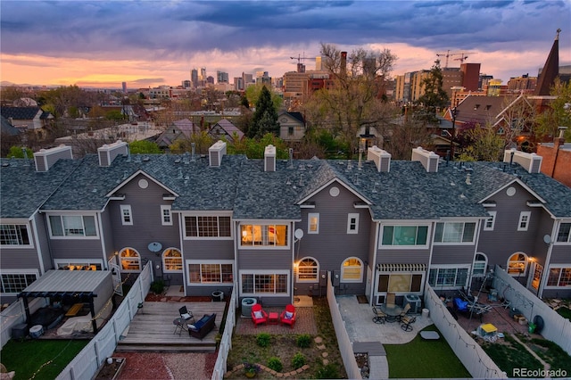 232 W 5th Ave, Denver, CO 80204 - exterior space featuring a chimney and a fenced backyard