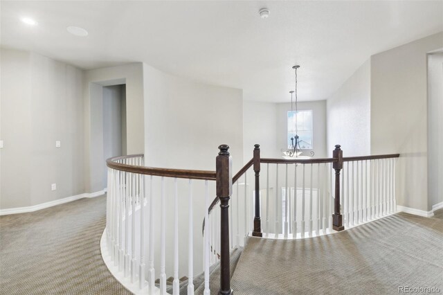 hallway featuring carpet floors