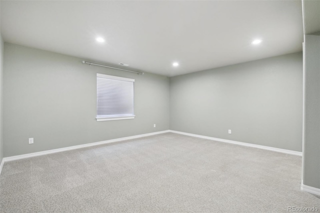 spare room featuring carpet flooring