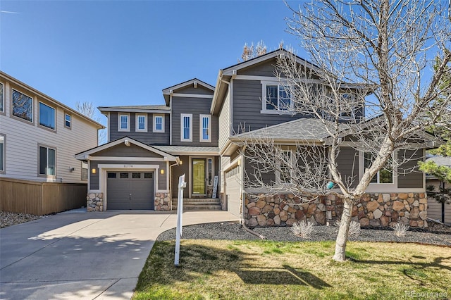 10774 Chadsworth Ln, Highlands Ranch, CO 80126 - craftsman-style home featuring stone siding and concrete driveway
