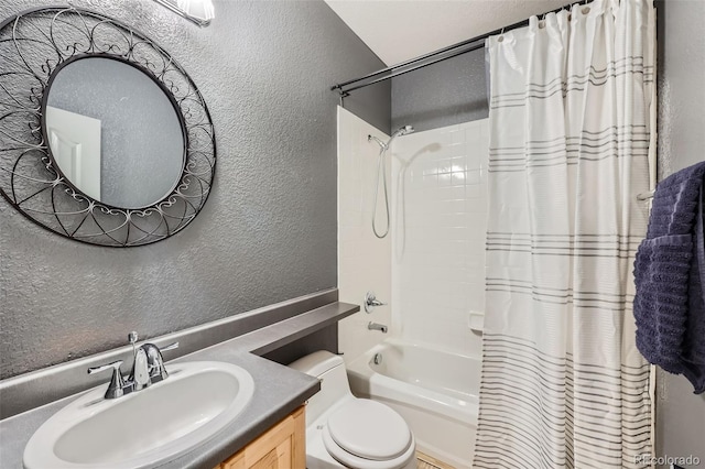 10774 Chadsworth Ln, Highlands Ranch, CO 80126 - bathroom featuring a textured wall, shower / tub combo, toilet, and vanity