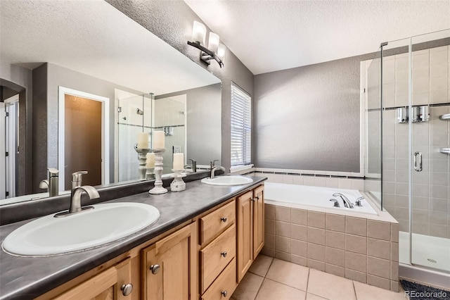 10774 Chadsworth Ln, Highlands Ranch, CO 80126 - bathroom with a bath, a shower stall, a textured wall, tile patterned flooring, and double vanity