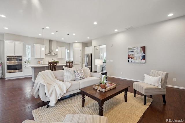 living area with baseboards, recessed lighting, dark wood-style floors, and visible vents