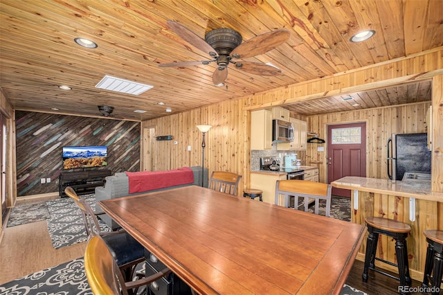 50 Pine St, Empire, CO 80438 - dining room with wooden walls, wooden ceiling, a ceiling fan, wood finished floors, and recessed lighting