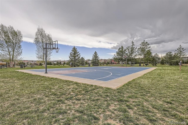 view of sport court featuring a yard and community basketball court
