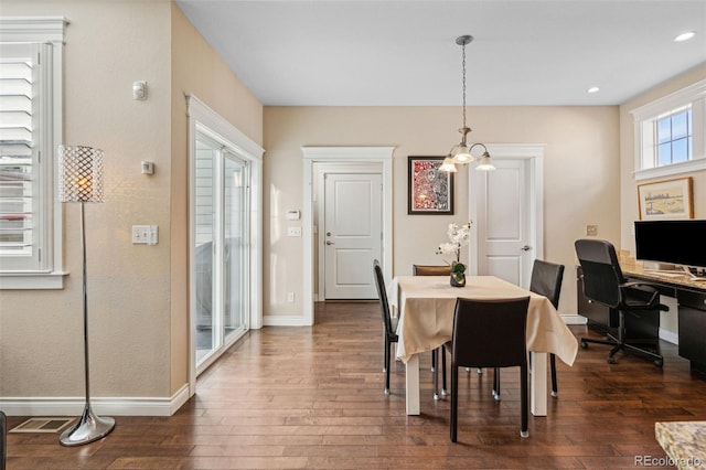 dining space featuring dark wood-style floors, recessed lighting, visible vents, and baseboards